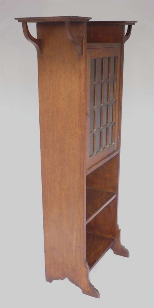 Narrow arts and crafts bookcase /cabinet in oak