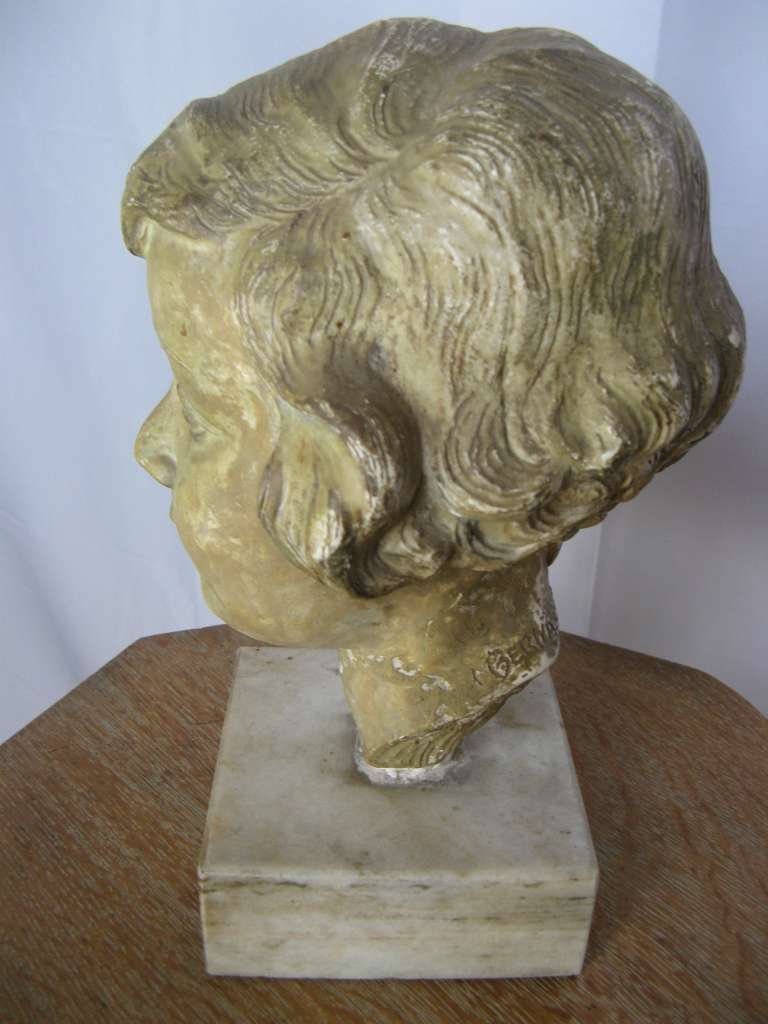 Plaster bust of a young girl by Mario Bernasconi 1899-1963