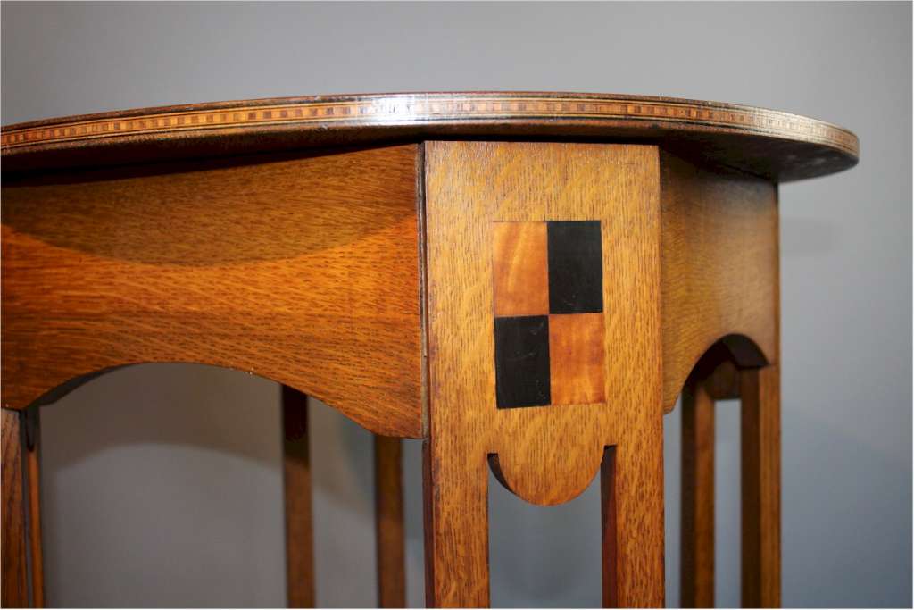 Good arts and crafts oak and bold inlaid table