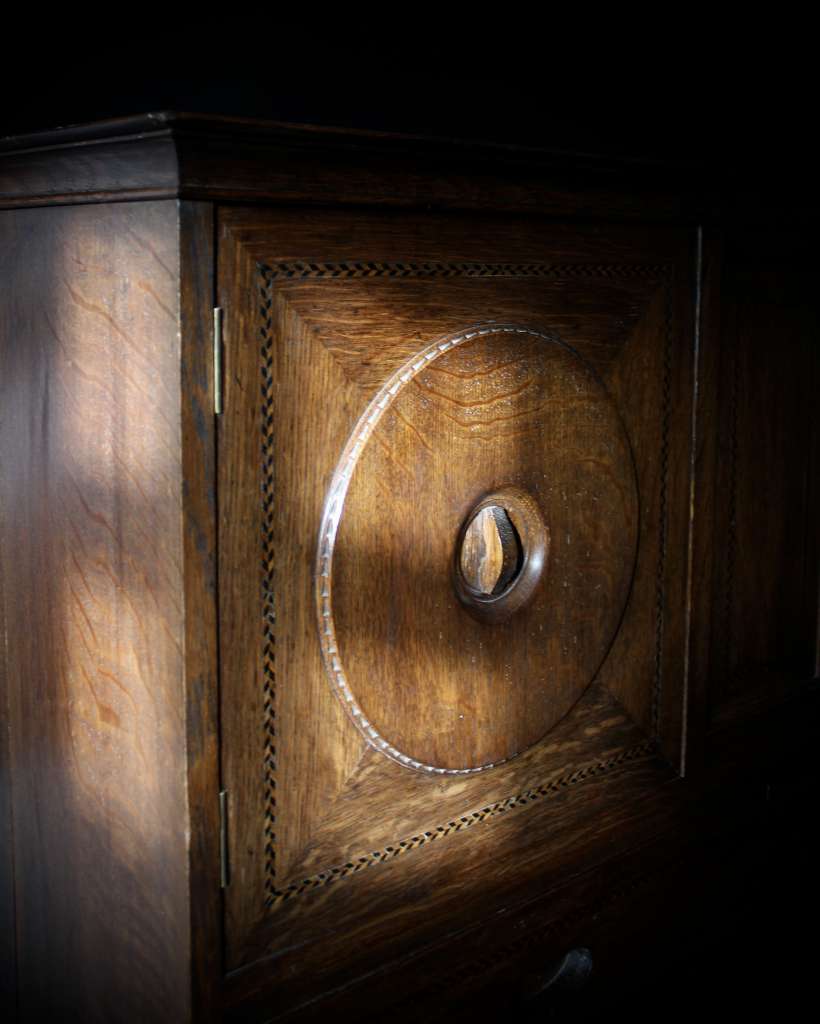 Arts and Crafts rare Ambrose Heal Owl cabinet in oak