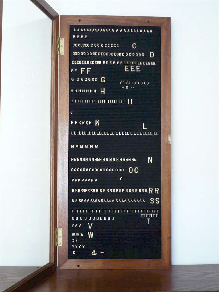 Mahogany notice board with moveable metal letters