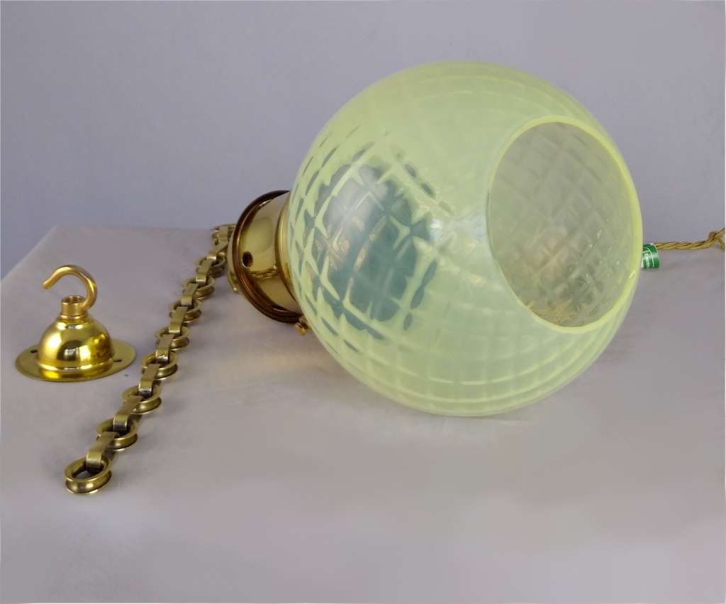 Vaseline glass hall light with brass fittings