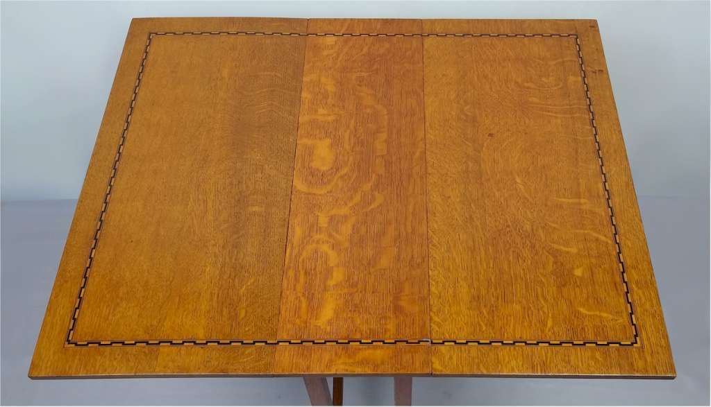 Arts and crafts inlaid drop leaf side table in oak