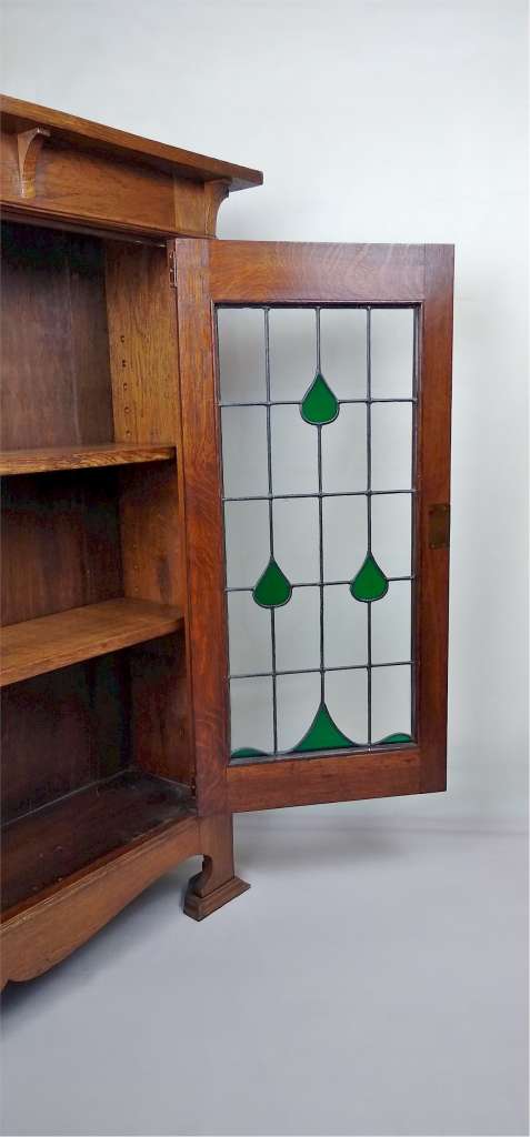 Classic arts and crafts bookcase green leaded glass