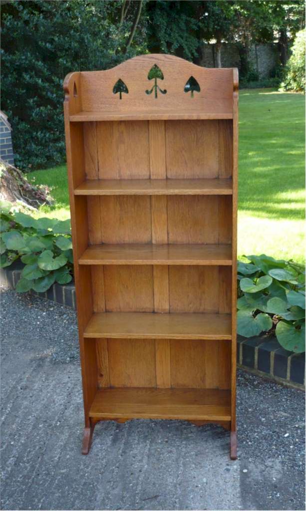 Arts and crafts bookcase with spear cut outs