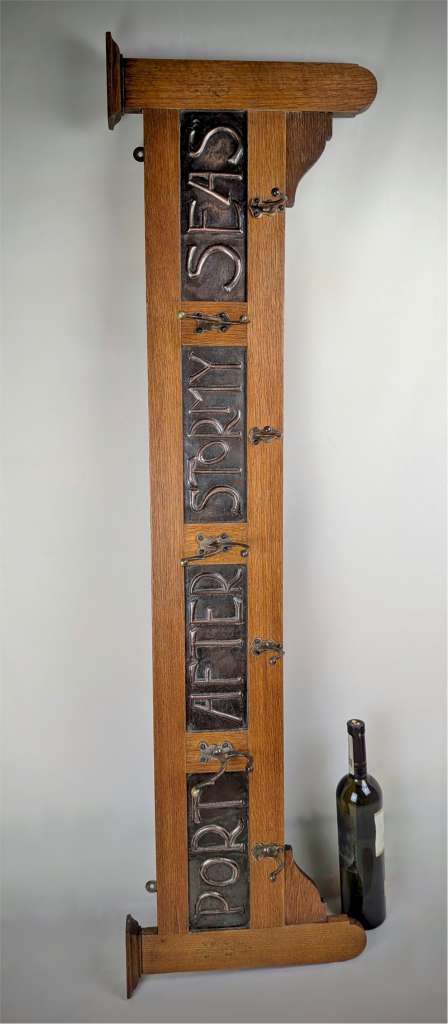 Arts and crafts hat/coat rack with copper motto