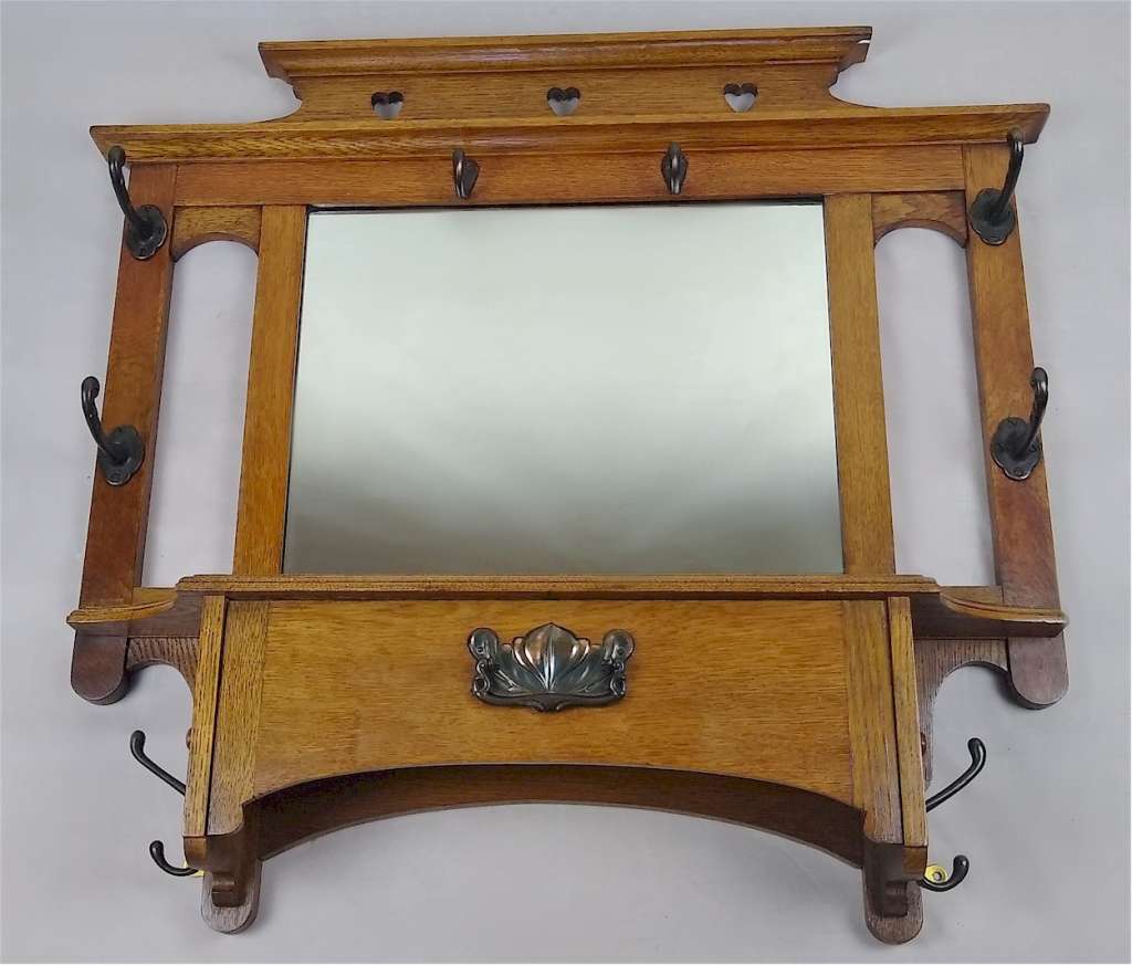 Arts and crafts mirror with drop front cupboard