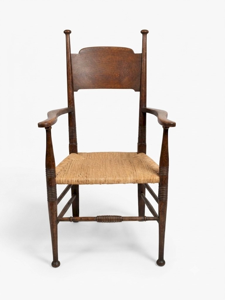 Arts and crafts elbow chair in oak William Birch