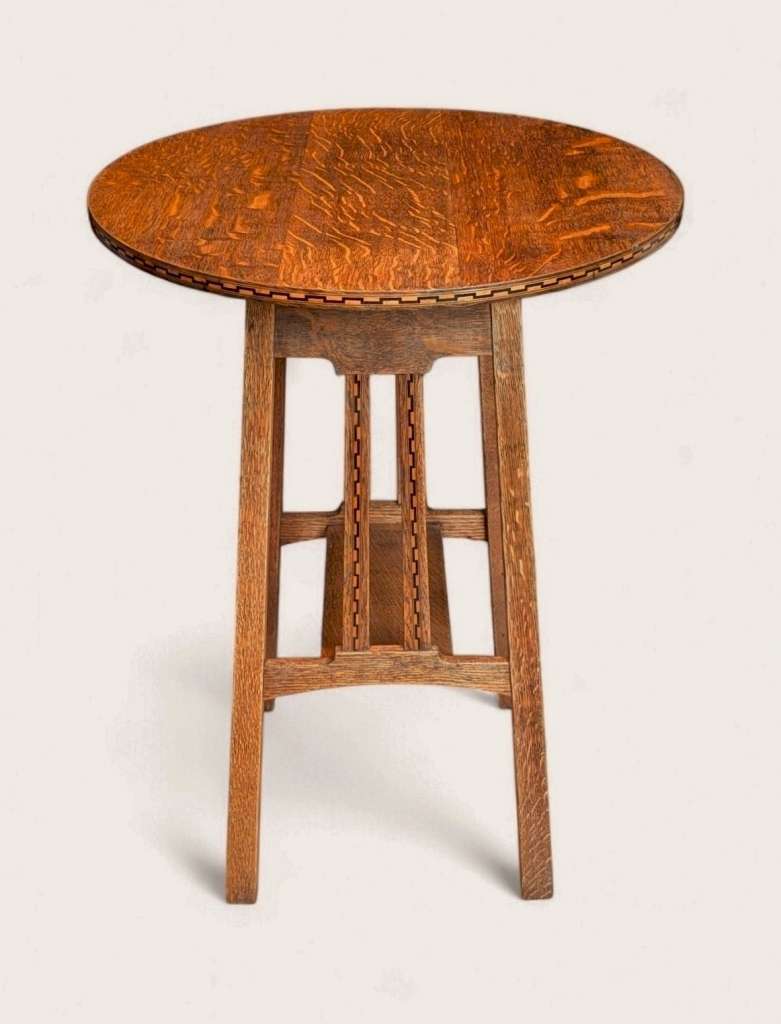 Arts and crafts inlaid circular side table in oak