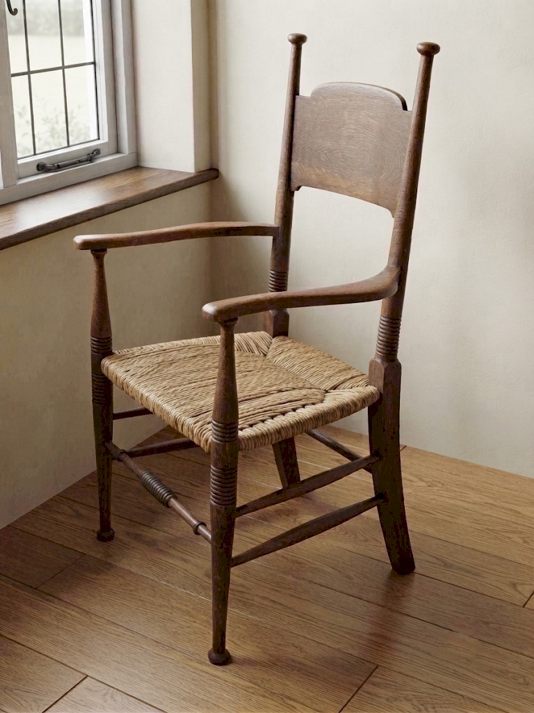 Arts and crafts elbow chair in oak William Birch