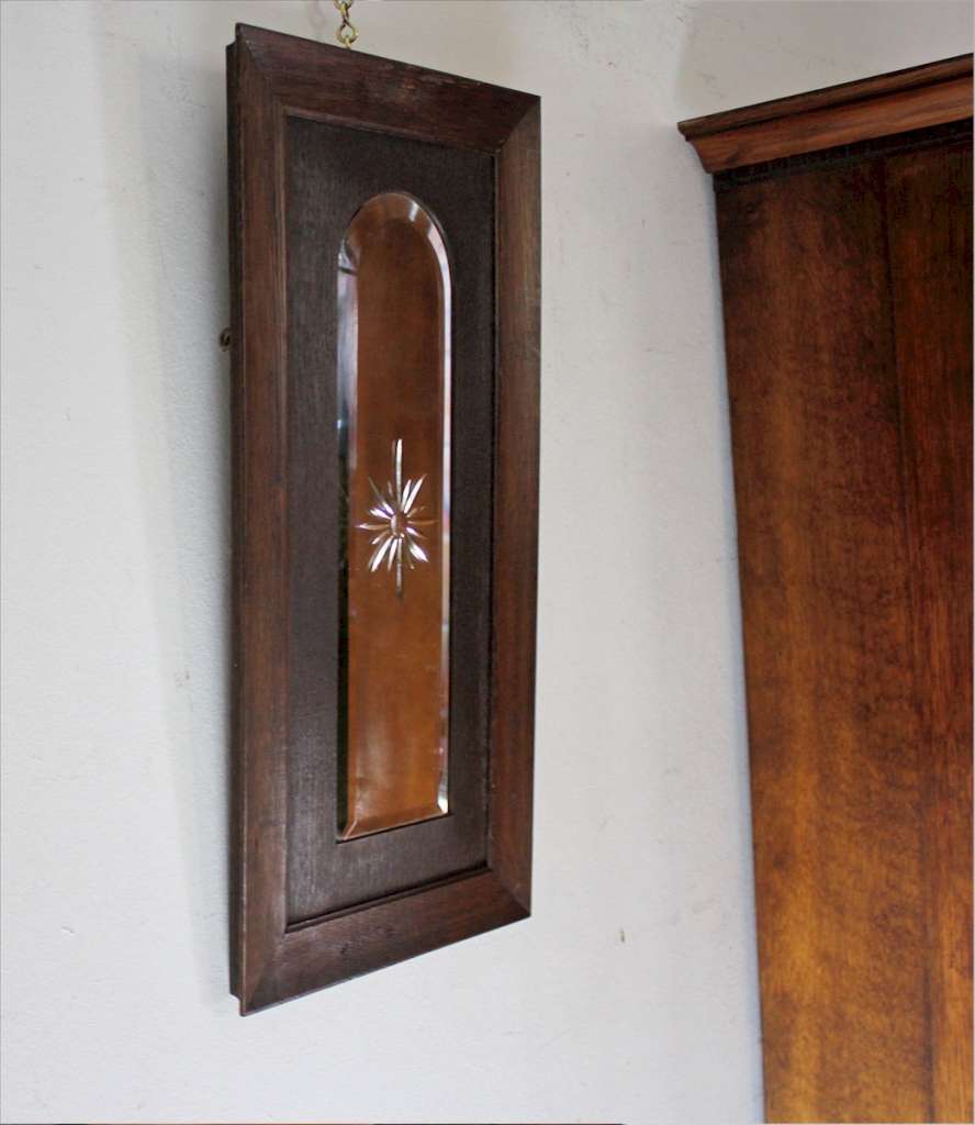 Edwardian oak framed arched mirror