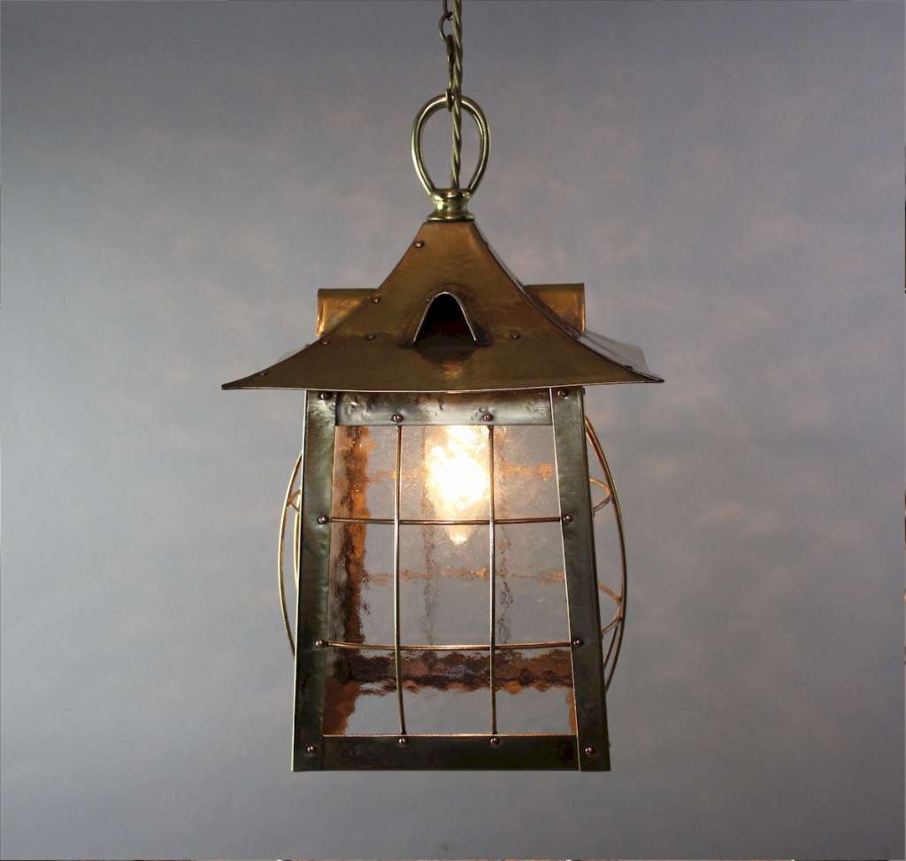 Arts and crafts brass cage lantern c1900