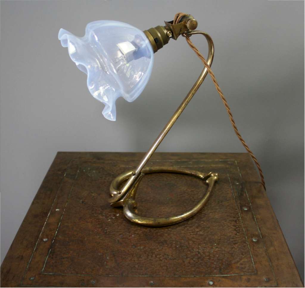 Arts and crafts table lamp in brass , designed by W.A.S Benson