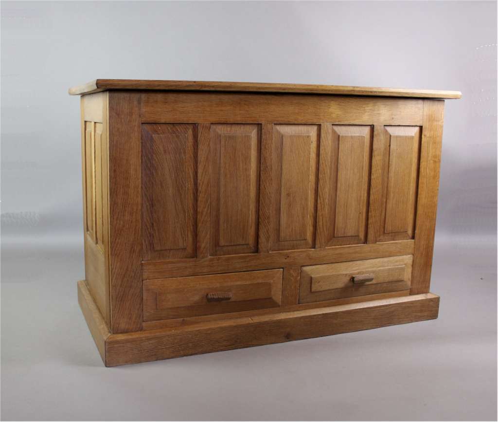 Oak blanket box with fielded panels in the manner of Heals and the Cotswold school