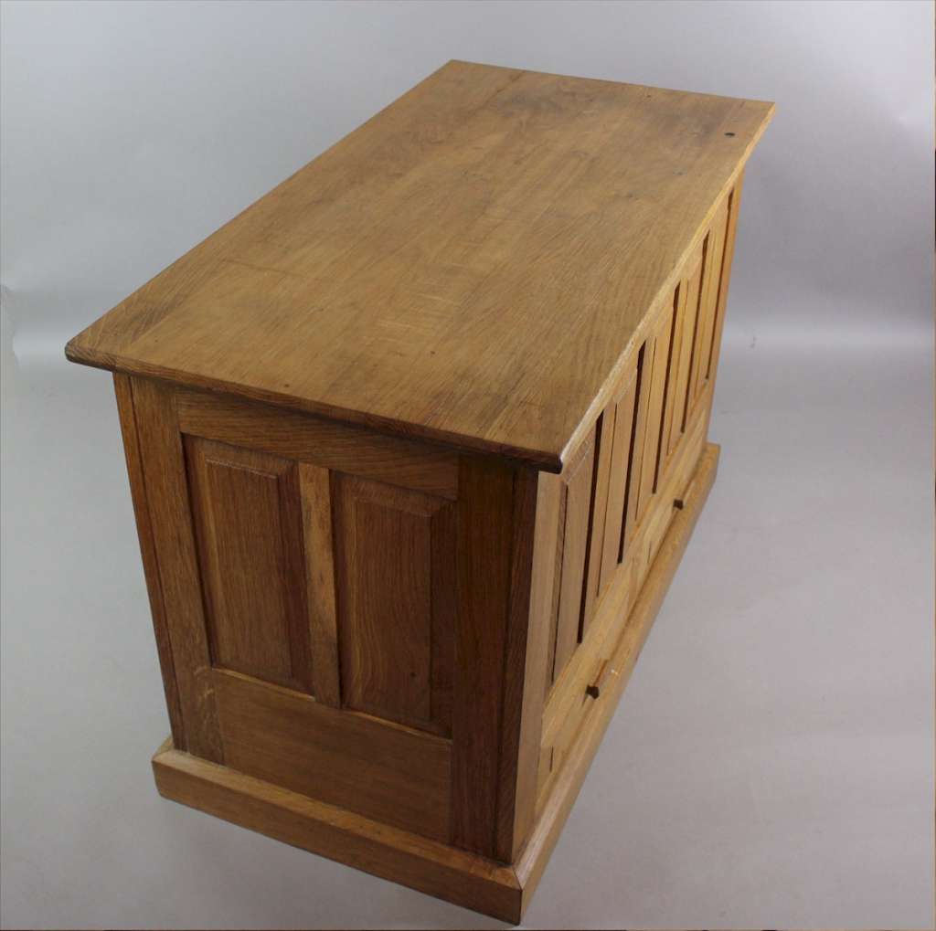 Oak blanket box with fielded panels in the manner of Heals and the Cotswold school