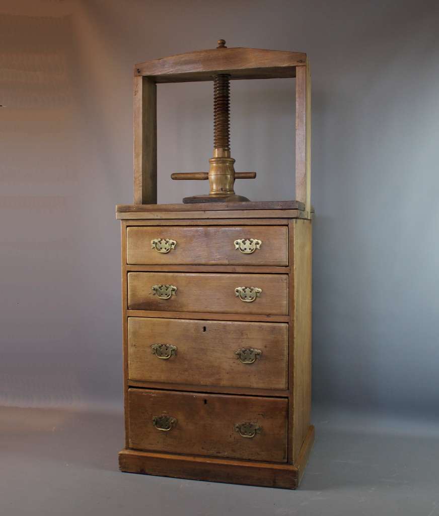 Antique pine book press chest of drawers.