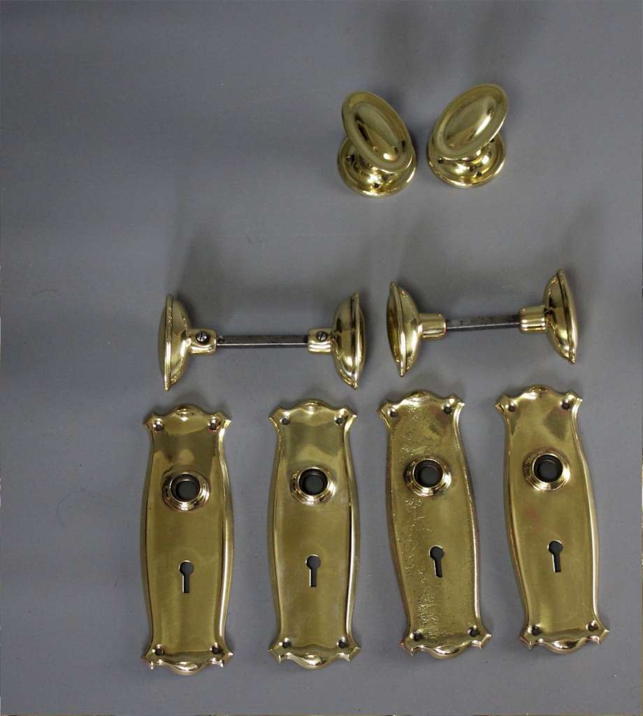 Edwardian brass door knobs with back plates