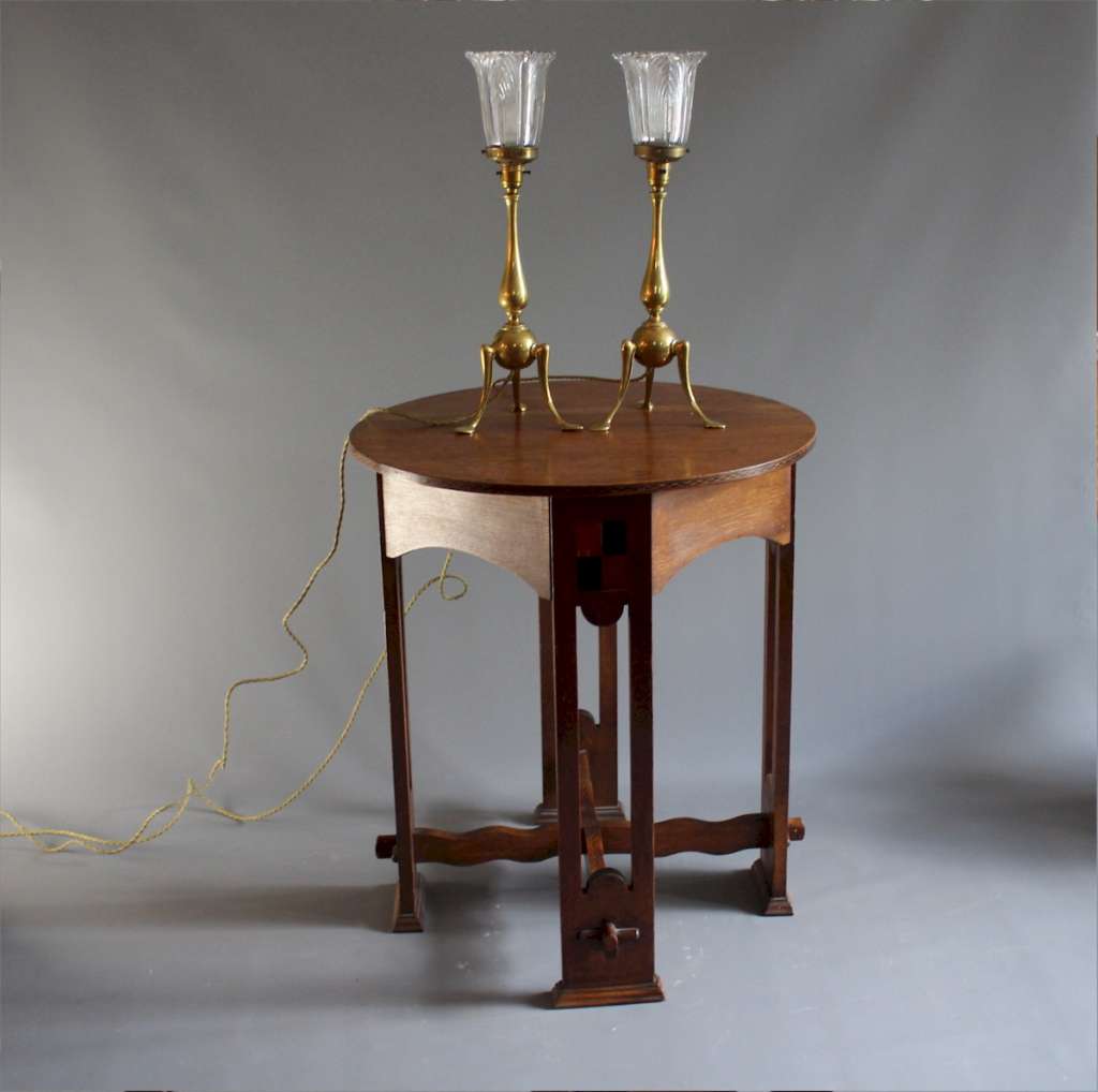 Pair of brass arts and crafts table lamps