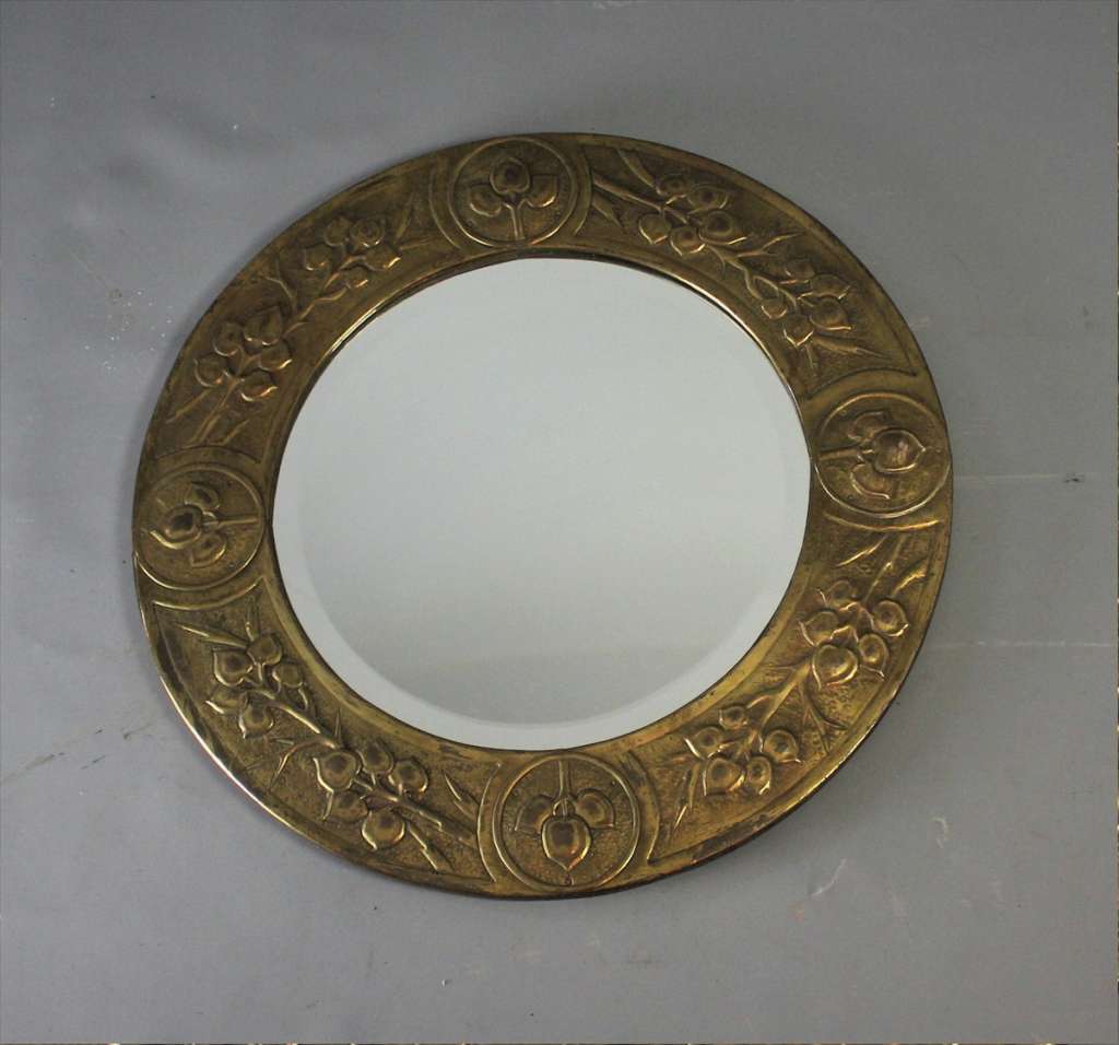 Arts and crafts circular brass wall mirror