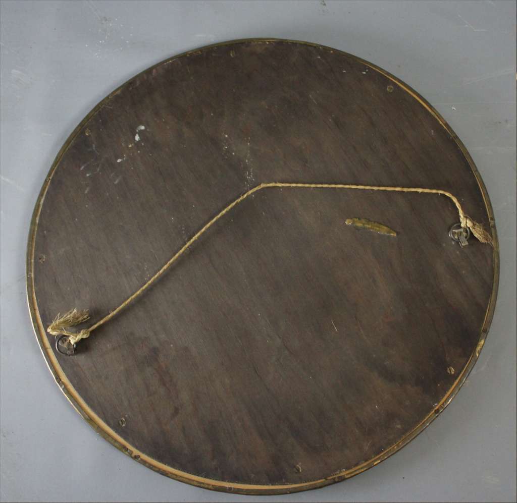 Arts and crafts circular brass wall mirror