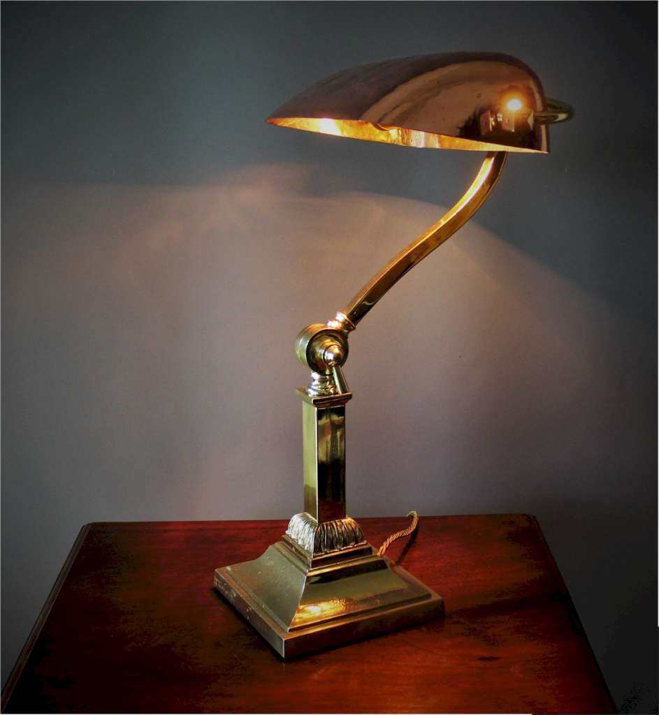 Antique bankers lamp in brass with copper shade