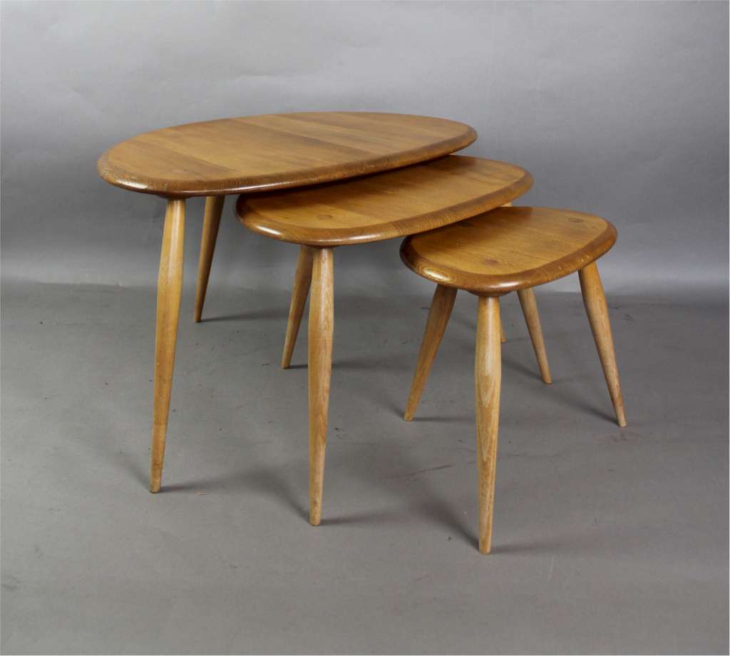 Ercol pebble nest of three tables in light coloured Elm
