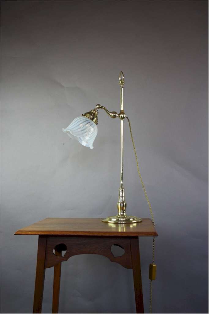Arts and Crafts brass table with vaseline shade