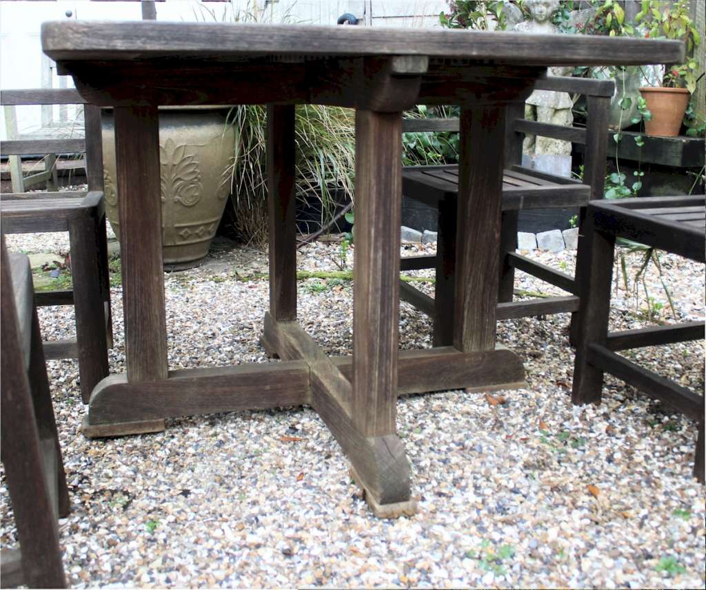Garden set in teak. Table and four chairs