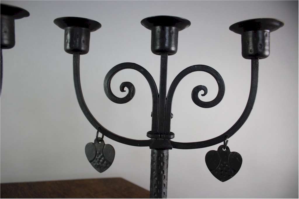 Pair of arts and crafts candlesticks by Goberg