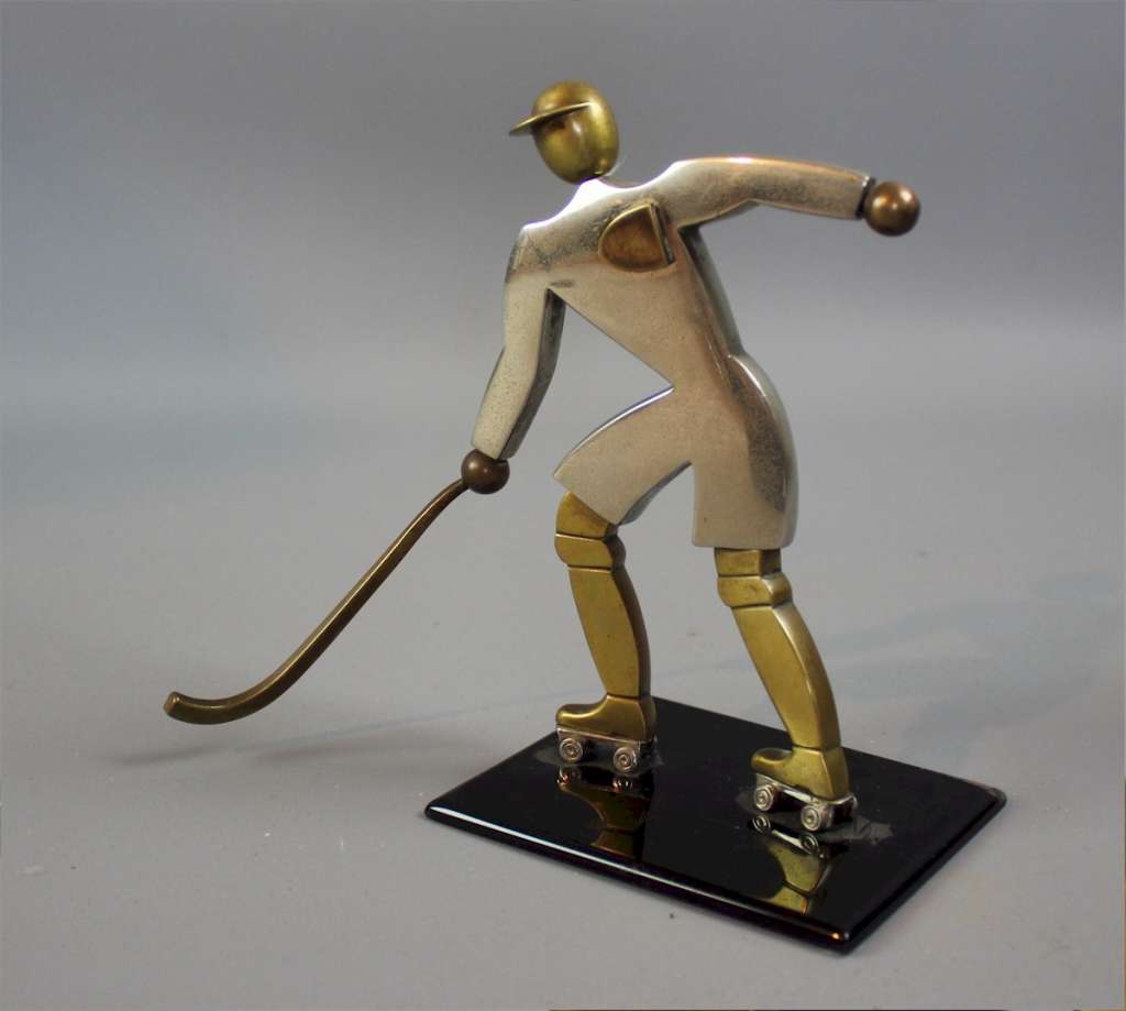 Art Deco brass figure of an ice hockey player