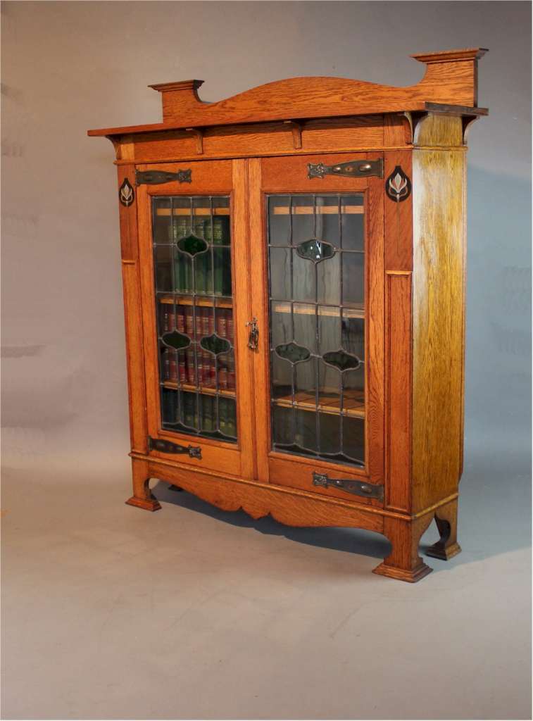 Arts and Crafts oak inlaid and glazed bookcase