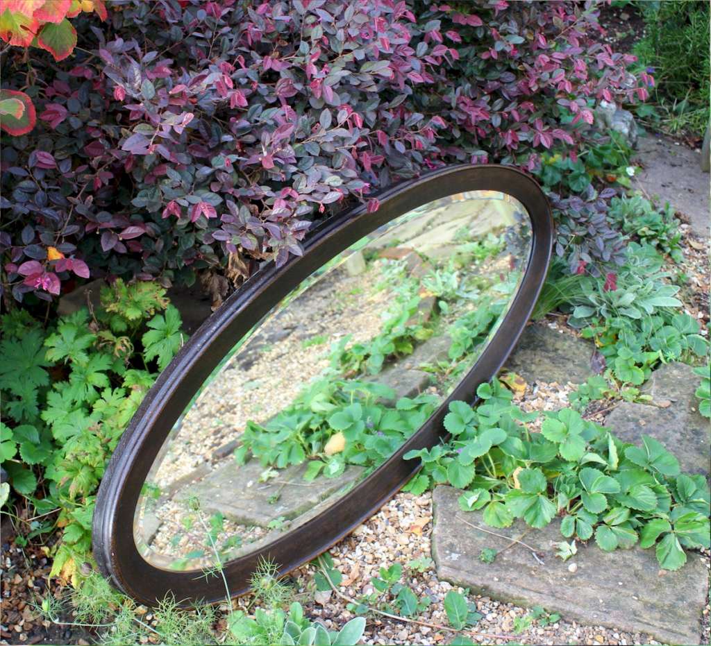 Large Edwardian oak oval mirror
