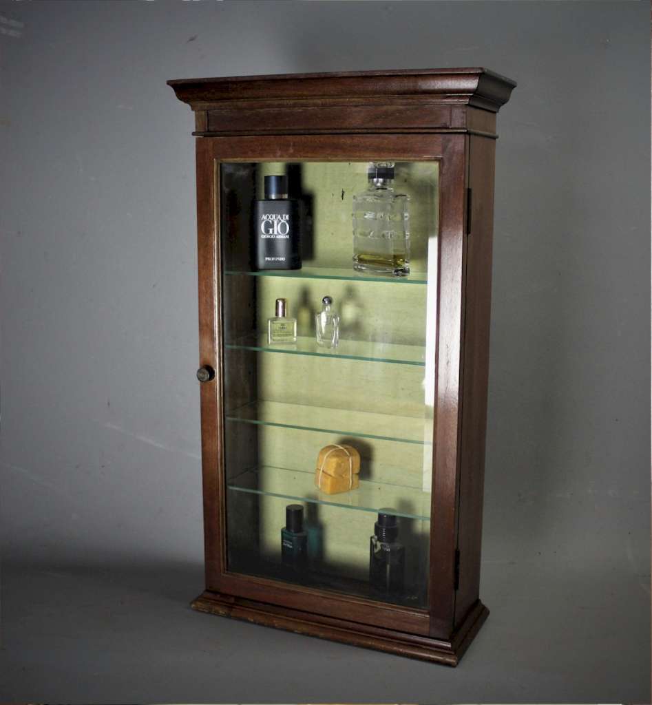 Mahogany perfume shop display cabinet.