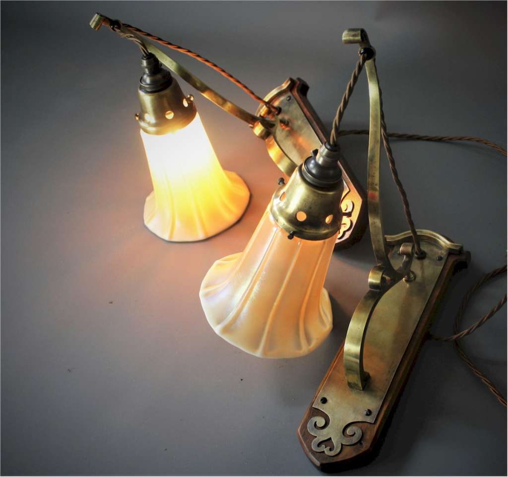 Pair of arts and crafts wall lights.