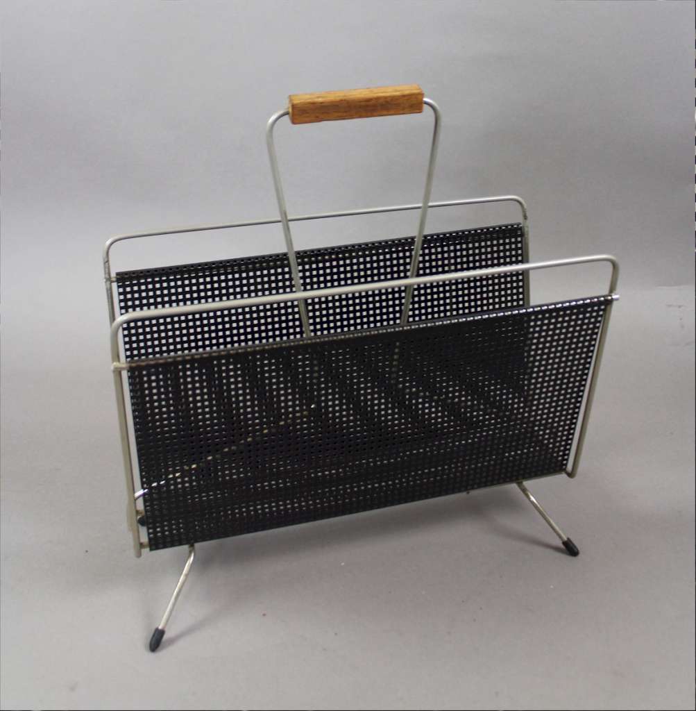 Perforated magazine rack from the 1950's