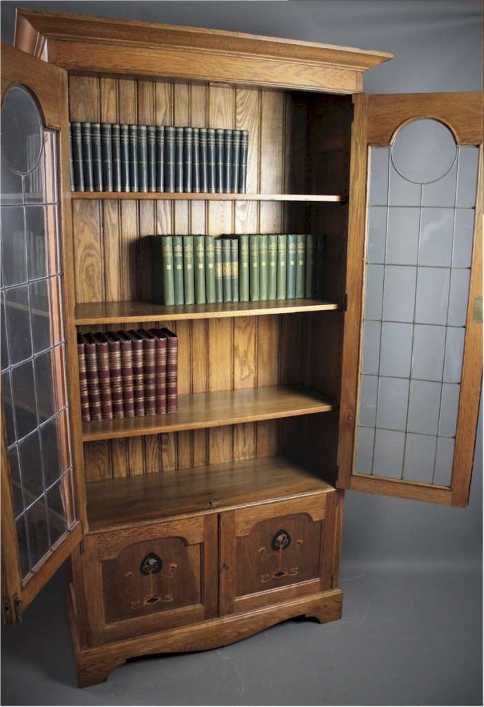 Arts and Crafts glazed bookcase with pewter ebony inlay