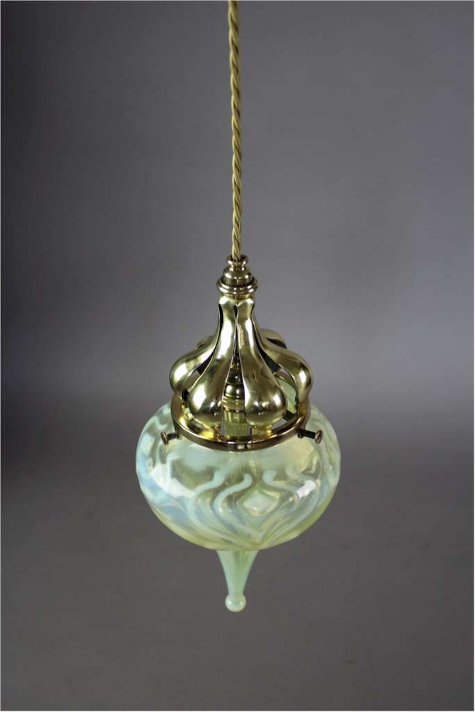 Wonderful arts and crafts brass and Powell shade pendant.