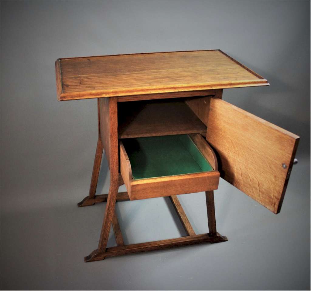Arts & Crafts bedside or tea table top cabinet. Designed by EG Punnet
