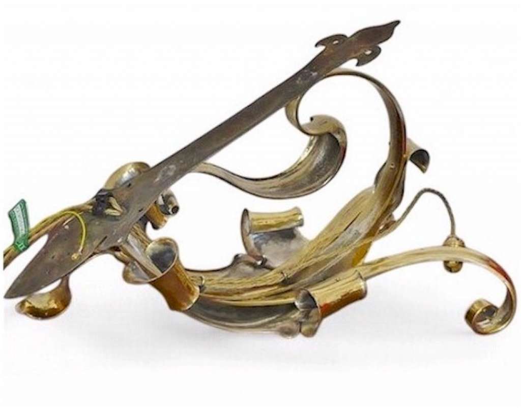 Spectacular arts and crafts wall light in hammered brass