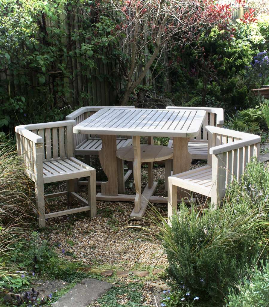  Reclaimed Teak Garden table with four wrap round chairs for Heals