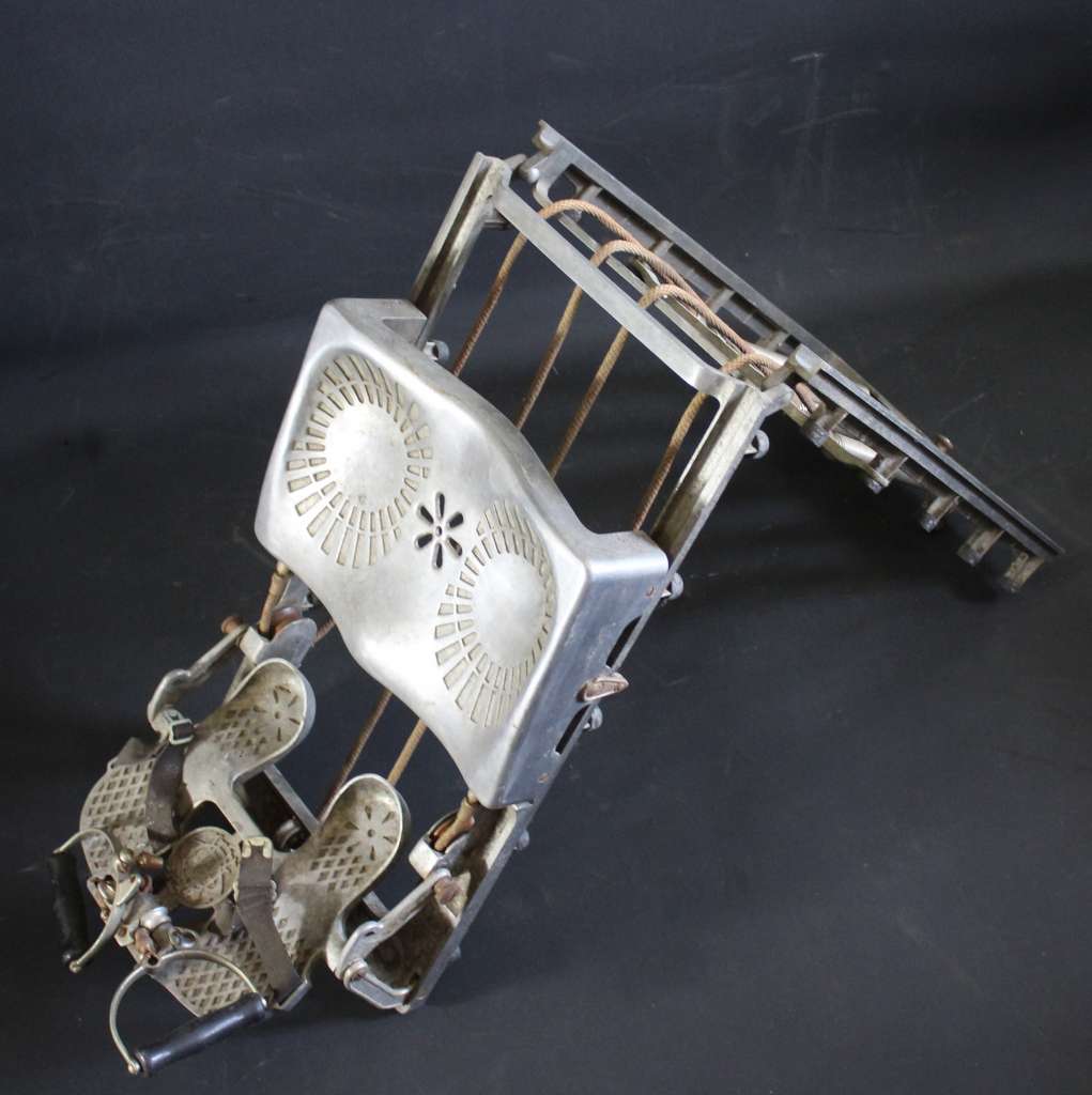 Well designed early 20th century collapsible rowing machine