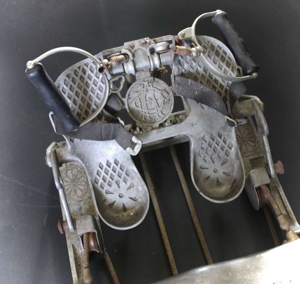 Well designed early 20th century collapsible rowing machine