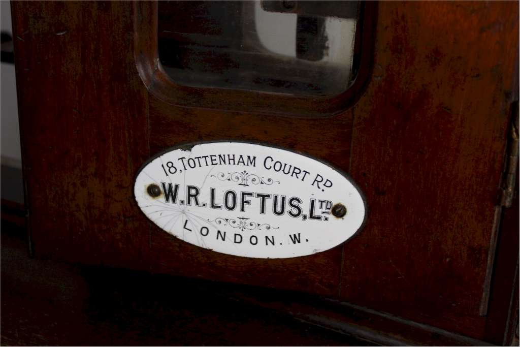 Victorian mahogany dispenser by W R Loftus