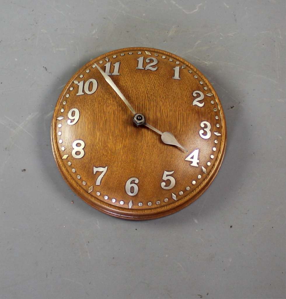 1930's Zenith for Heals oak domed wall clock.