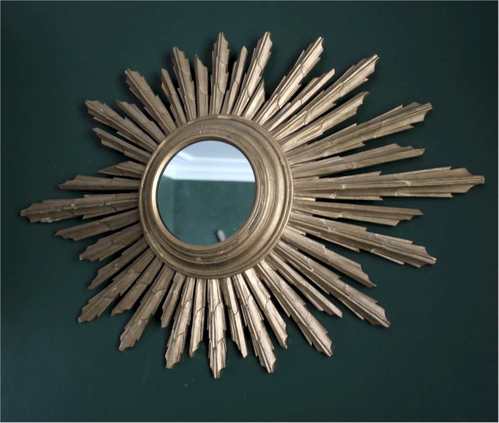 Sunburst gilt wood mirror.