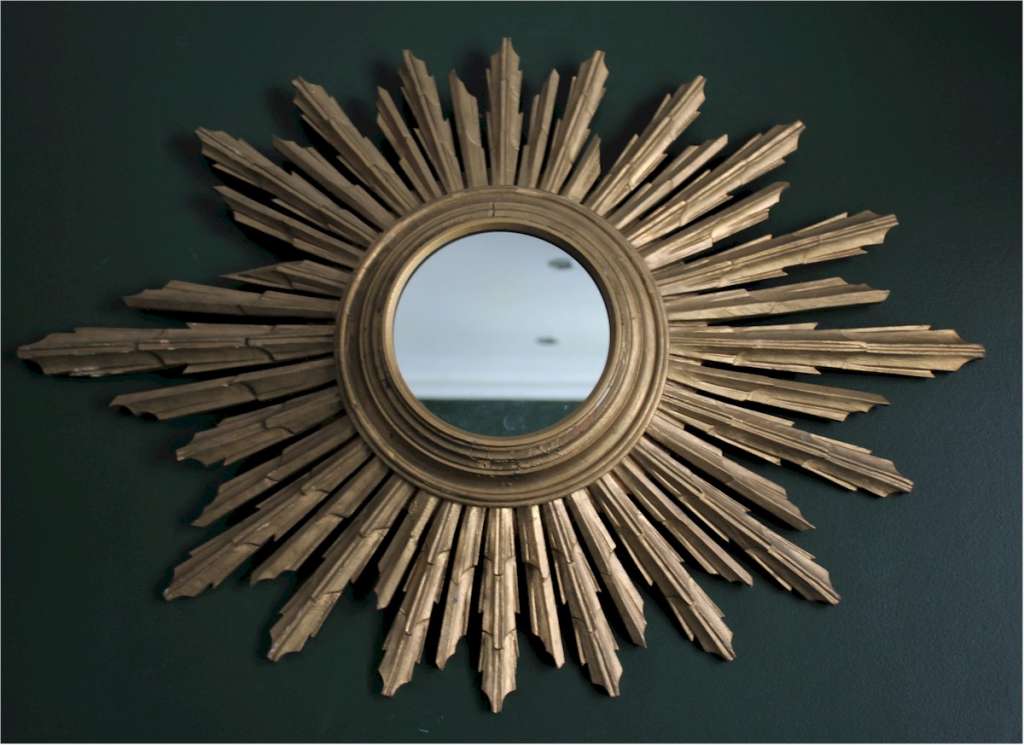 Sunburst gilt wood mirror.