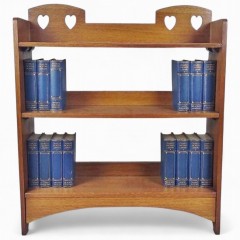 Double heart arts and crafts bookcase in oak