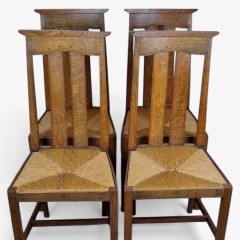  Arts and crafts oak dining chairs by Liberty