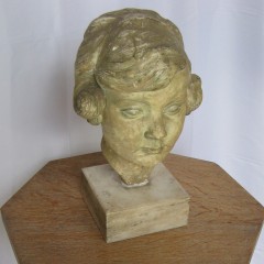 Plaster bust of a young girl by Mario Bernasconi 1899-1963