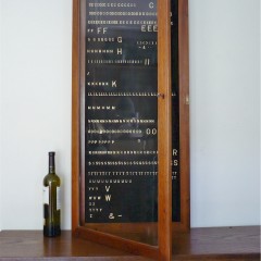 Mahogany notice board with moveable metal letters